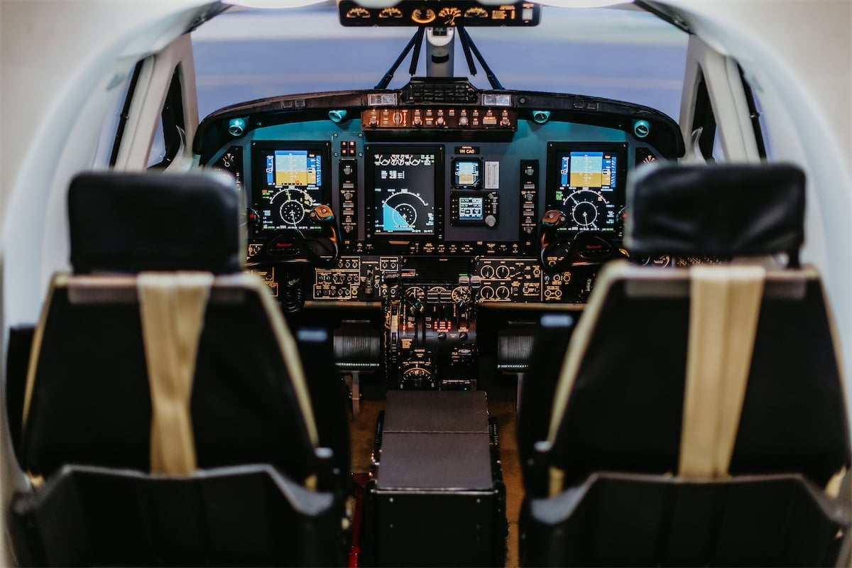 Airplane cockpit interior with seats and instruments