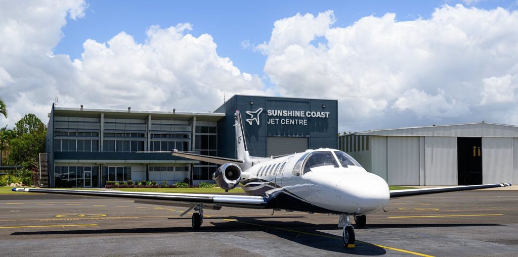 Sunshine Coast Jet Centre with parked airplane.