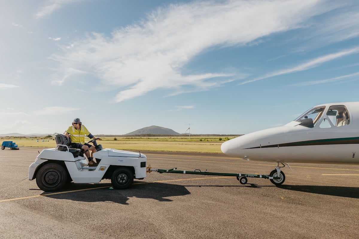 Aircraft being towed at an airport as part of our aircraft management services.